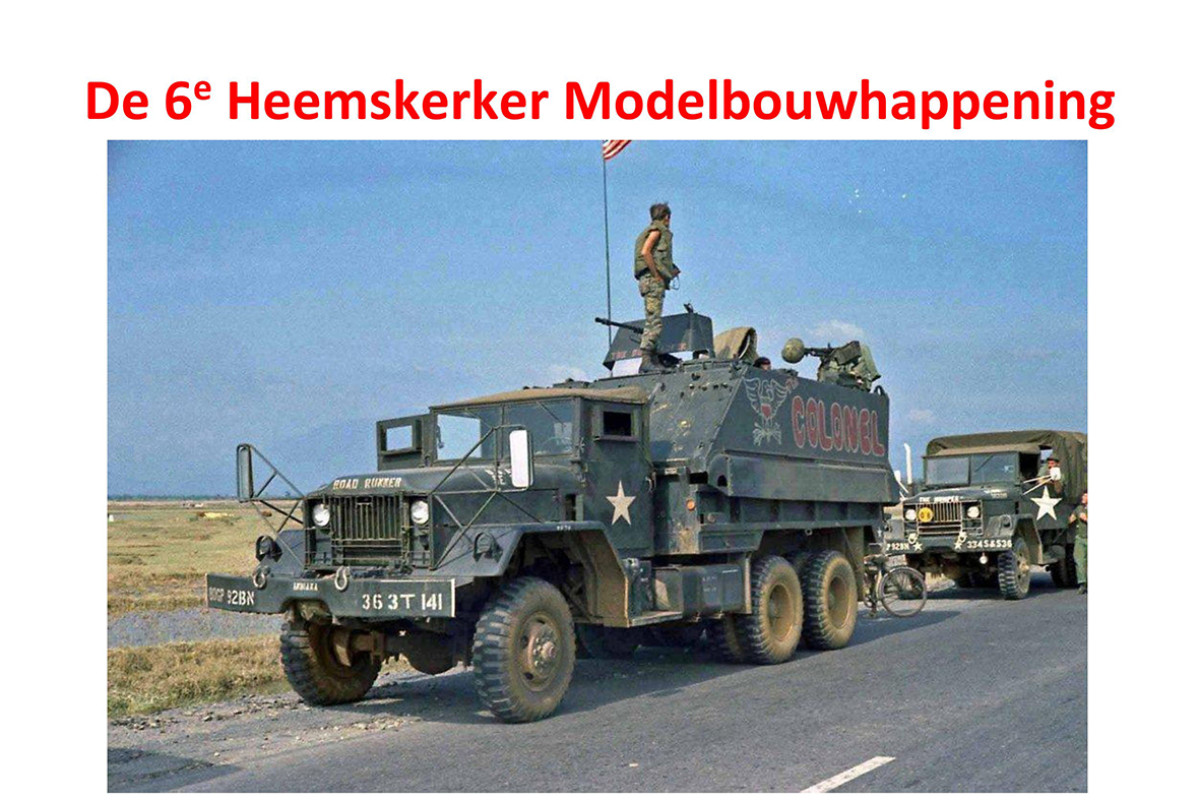 Militair voortuig met daarboven de tekst 6e Heemskerker Mobelbouwhappening